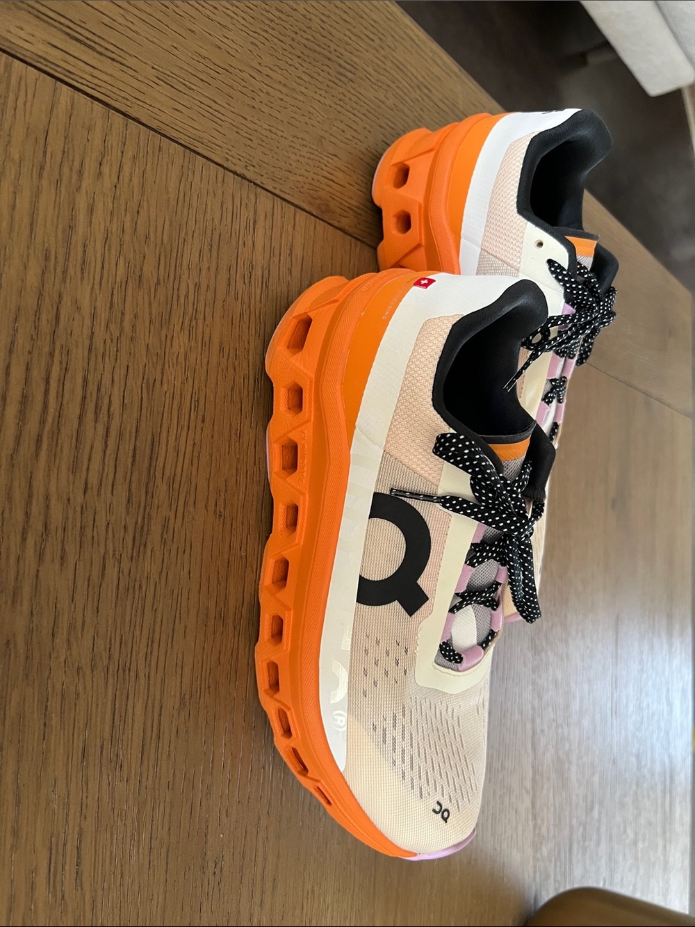 On Running Women’s Orange and White Cloud-Style Sneakers